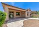 Covered patio with desert landscaping and view of the exterior of the home at 3886 E Ficus Way, Gilbert, AZ 85298