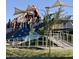 Vibrant community playground with shaded structures, slides, climbing features, and ample space for recreation at 3886 E Ficus Way, Gilbert, AZ 85298