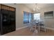 Bright dining space featuring modern appliances and a breakfast nook at 3925 N 160Th Ave, Goodyear, AZ 85395