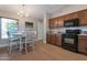 Cozy dining area with natural light and modern chandelier at 3925 N 160Th Ave, Goodyear, AZ 85395