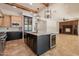 Spacious kitchen island features stainless steel appliances, pendant lighting, and ample counter space at 3971 E Leo Pl, Chandler, AZ 85249