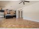 Bright, open concept living area showcasing a spacious kitchen with stainless steel appliances at 3971 E Leo Pl, Chandler, AZ 85249