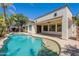 Inviting backyard with a private pool and a covered patio, perfect for outdoor entertaining and relaxation at 3971 E Leo Pl, Chandler, AZ 85249
