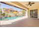 Backyard with an in-ground pool surrounded by desert landscaping at 3971 E Leo Pl, Chandler, AZ 85249