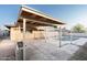 Inviting backyard features a covered patio and a fenced pool area, perfect for relaxation and outdoor activities at 4628 W Solano S Dr, Glendale, AZ 85301