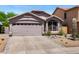 Charming single-story home featuring a well-maintained yard and a convenient two-car garage at 4704 E Melinda Ln, Phoenix, AZ 85050