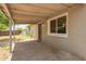 Covered back patio and side yard for storage and outdoor living at 5029 W Osborn Rd, Phoenix, AZ 85031