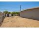 Spacious dirt lot with a shed in the backyard at 5029 W Osborn Rd, Phoenix, AZ 85031
