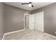Bedroom featuring updated flooring, neutral paint, closet, and updated doors at 5029 W Osborn Rd, Phoenix, AZ 85031