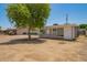 Charming single-story home featuring a well-maintained front yard and a welcoming entrance at 5029 W Osborn Rd, Phoenix, AZ 85031