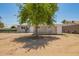 Charming single-story home featuring a well-maintained front yard and a welcoming entrance at 5029 W Osborn Rd, Phoenix, AZ 85031