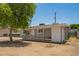 Charming single-story home featuring a well-maintained front yard and a welcoming entrance at 5029 W Osborn Rd, Phoenix, AZ 85031