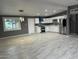 Spacious kitchen with sleek stainless steel appliances and modern white cabinets at 5029 W Osborn Rd, Phoenix, AZ 85031