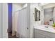 Clean bathroom with shower, tub, and vanity with mirror, offering a functional and bright space at 5661 S Dante --, Mesa, AZ 85212