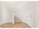 Bright entryway features a staircase with white railing and wood-look tile floors at 5661 S Dante --, Mesa, AZ 85212