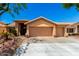 Charming home with a well-manicured front yard and a spacious three-car garage at 5912 W Gail Dr, Chandler, AZ 85226