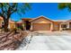 Charming home with a well-manicured front yard and a spacious three-car garage at 5912 W Gail Dr, Chandler, AZ 85226