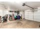 Spacious garage with plenty of storage space and a three car garage door at 5912 W Gail Dr, Chandler, AZ 85226