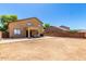 Expansive backyard with patio and block wall, ideal for outdoor activities at 6320 S 26Th Dr, Phoenix, AZ 85041