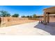 Spacious backyard with concrete patio, block fence, and potential for landscaping at 6320 S 26Th Dr, Phoenix, AZ 85041