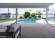 Relaxing outdoor patio overlooking a pool and landscaped backyard, offering a serene retreat at 6608 E Lewis Ave, Scottsdale, AZ 85257