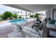 Cozy patio area with comfortable seating and a view of the pool and backyard, great for relaxing at 6608 E Lewis Ave, Scottsdale, AZ 85257
