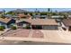 Residential home featuring desert landscaping, mountain views, and a two car garage at 6838 E Belleview St, Scottsdale, AZ 85257