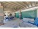 Covered outdoor patio, perfect for relaxing, that overlooks the refreshing swimming pool at 6838 E Belleview St, Scottsdale, AZ 85257