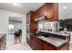 Updated kitchen with sleek appliances, ample counter space, and an open design for easy access at 6838 E Belleview St, Scottsdale, AZ 85257