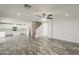 Spacious living area with tile floors, abundant natural light, and an open layout perfect for entertaining at 763 E Maddison St, San Tan Valley, AZ 85140