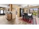 Dining area with a table, chairs, and view of the backyard through sliding glass doors at 7673 N Via De Platina Dr, Scottsdale, AZ 85258