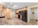 Bright and modern kitchen with stainless steel appliances and ample storage at 7673 N Via De Platina Dr, Scottsdale, AZ 85258
