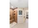 Modern shower stall featuring brown tile and convenient built-in shelving niche at 7673 N Via De Platina Dr, Scottsdale, AZ 85258