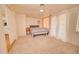Spacious bedroom with carpet and natural light, featuring neutral tones and ample space at 809 N Gilbert Ave, Casa Grande, AZ 85122