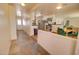Modern kitchen with stainless steel appliances, adjoining a cozy dining area at 809 N Gilbert Ave, Casa Grande, AZ 85122