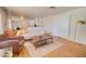Inviting living room with hardwood floors, a comfortable sofa, and stylish decor at 809 N Gilbert Ave, Casa Grande, AZ 85122