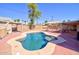 Inviting pool area with a covered patio, perfect for outdoor relaxation and entertainment at 809 N Gilbert Ave, Casa Grande, AZ 85122