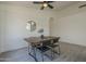 Dining area featuring a modern table and chairs, perfect for Gathering meals at 8370 W Audrey Ln, Peoria, AZ 85382