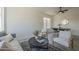 Open-concept layout with stylish seating arrangement and modern decor at 8370 W Audrey Ln, Peoria, AZ 85382
