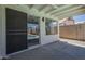 Covered patio offers a shady outdoor living space, with views of the pool at 8370 W Audrey Ln, Peoria, AZ 85382
