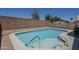 Backyard swimming pool with clear blue water, set in a private walled-in yard at 8370 W Audrey Ln, Peoria, AZ 85382