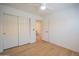 This bedroom has wood-look flooring and closet space at 866 W Geronimo St, Chandler, AZ 85225