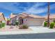 Charming single-story home with a well-manicured front yard and solar panels on the roof at 866 W Geronimo St, Chandler, AZ 85225