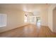 Bright and airy living room featuring wood floors, large windows, and an open floor plan at 866 W Geronimo St, Chandler, AZ 85225