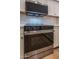 Elegant black and stainless steel oven, a modern appliance promising enhanced cooking experience at 866 W Geronimo St, Chandler, AZ 85225