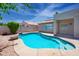 Inviting backyard pool with surrounding patio, perfect for relaxing and entertaining at 866 W Geronimo St, Chandler, AZ 85225