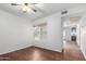 Bright bedroom boasting wood flooring and a large window for natural light at 8787 E Mountain View Rd # 1087, Scottsdale, AZ 85258