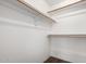 Spacious walk-in closet with built-in shelving providing ample storage space at 8787 E Mountain View Rd # 1087, Scottsdale, AZ 85258
