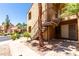 Exterior elevation with private entrance and covered stairs, offering a unique blend of privacy and accessibility at 8787 E Mountain View Rd # 1087, Scottsdale, AZ 85258
