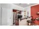 Kitchenette features stainless steel appliances, granite countertops and breakfast bar at 8787 E Mountain View Rd # 1087, Scottsdale, AZ 85258